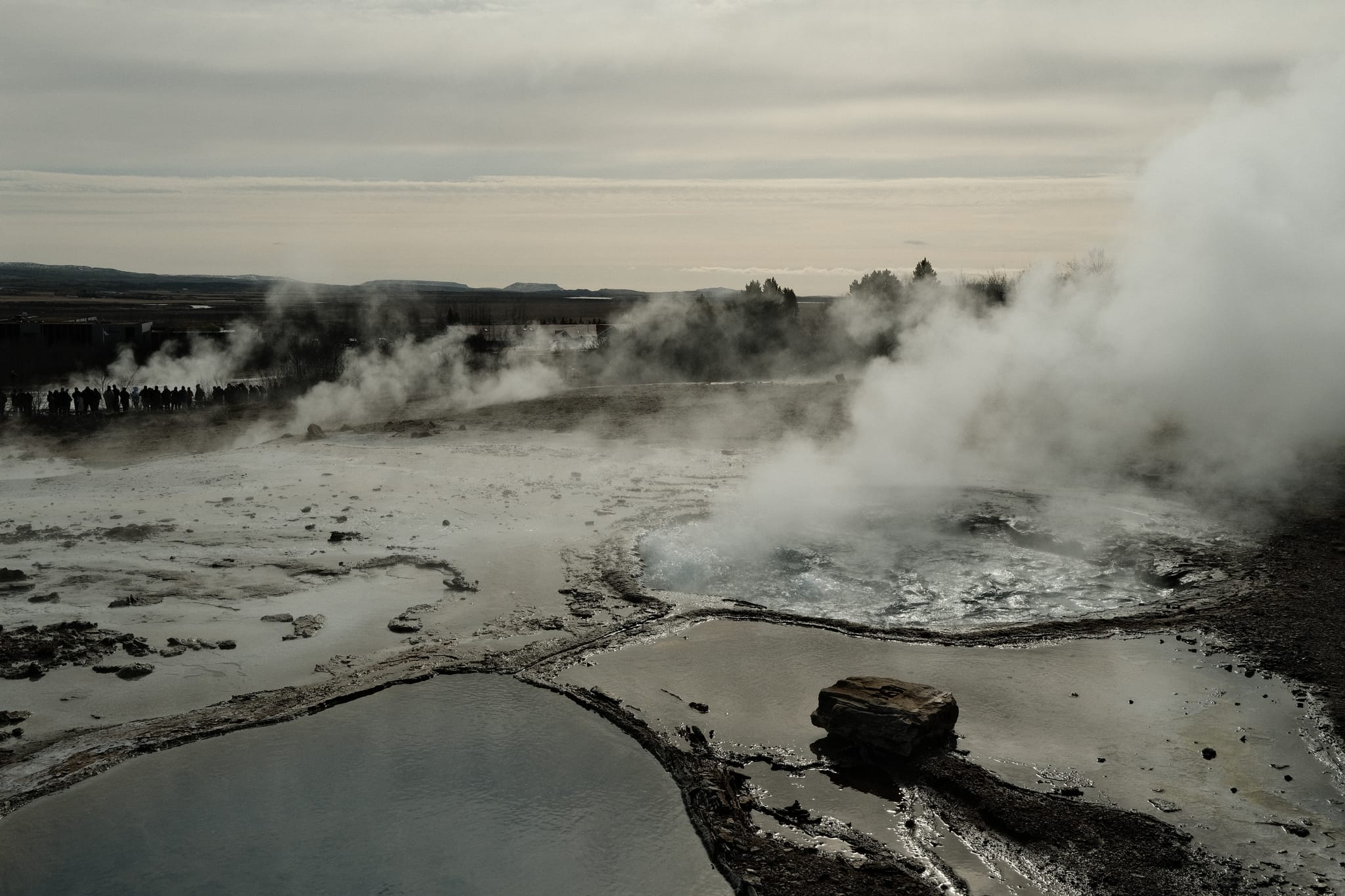 Geysir Field — Steam drifts over the geothermal flats.